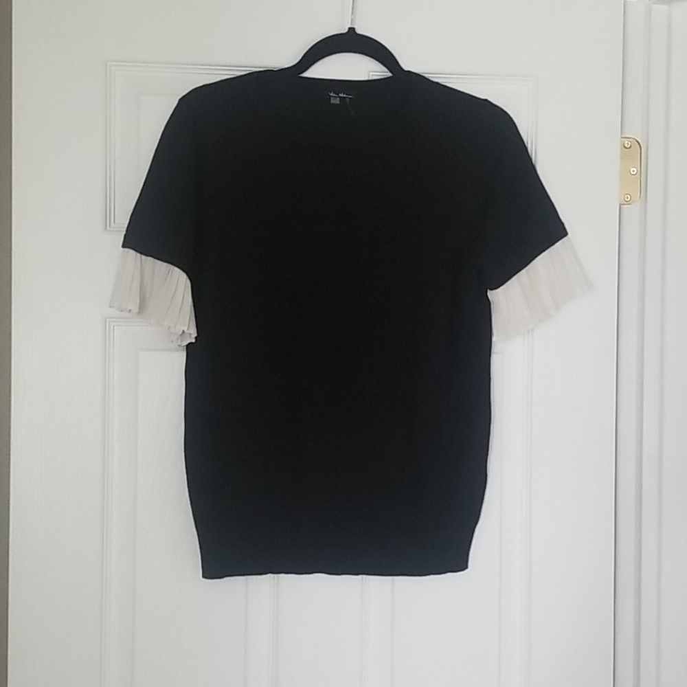 Vila Milano black top with ruffle sleeves.
